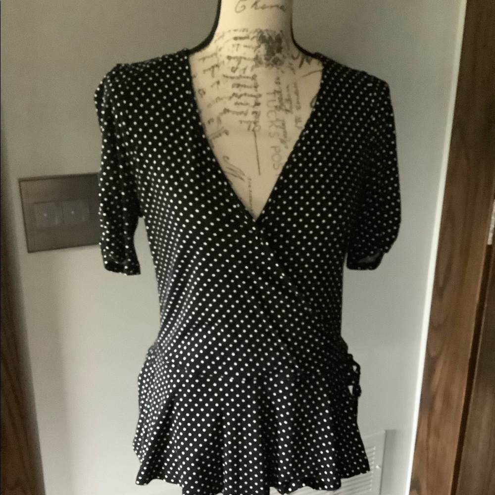 Black short sleeved polka dot wrap top